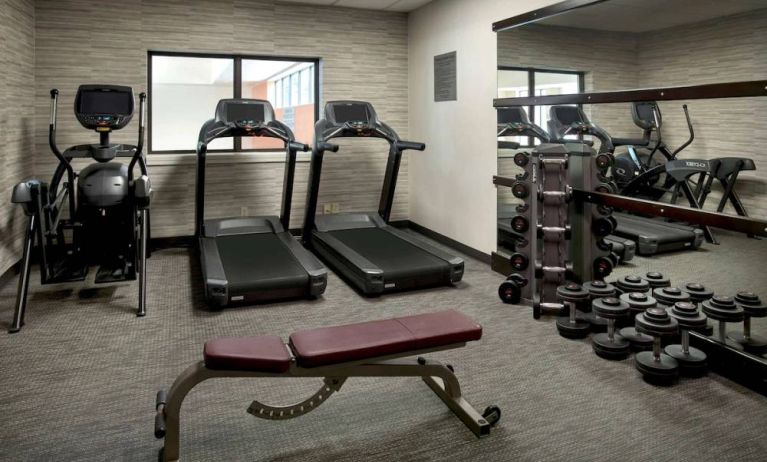 The hotel’s fitness center has treadmills, an elliptical machine, bench, and assorted free weights.