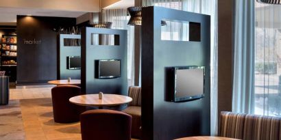 Sonesta Select Boston Milford’s media pods are cozy nooks with comfy seating, televisions, and coffee tables.