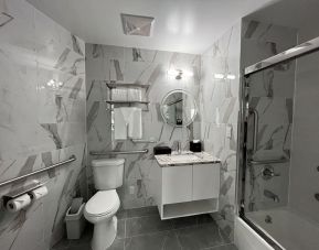 Guest bathroom with shower at Starlight hotel. 