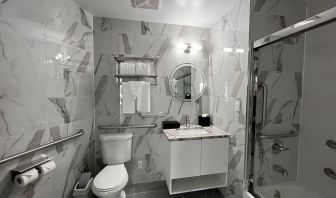 Guest bathroom with shower at Starlight hotel. 