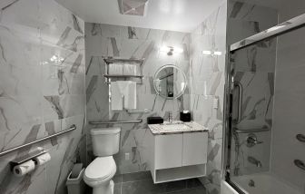 Guest bathroom with shower at Starlight hotel. 