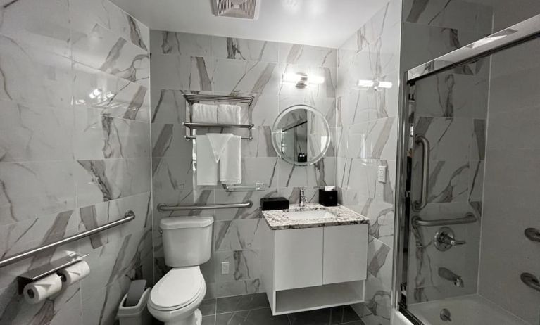 Guest bathroom with shower at Starlight hotel. 