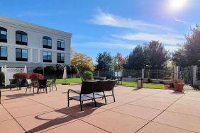 Outdoor garden and terrace area at Holiday Inn Belcamp - Aberdeen Area.