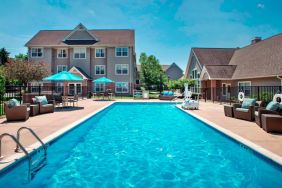 The hotel’s outdoor pool has armchairs and shaded tables/chairs nearby, and is equipped with a lift.