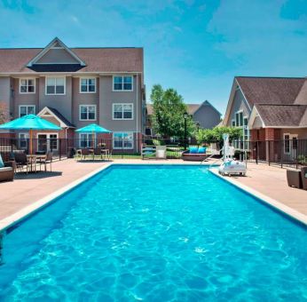 The hotel’s outdoor pool has armchairs and shaded tables/chairs nearby, and is equipped with a lift.