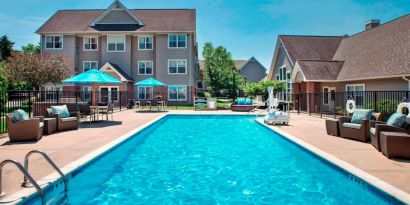 The hotel’s outdoor pool has armchairs and shaded tables/chairs nearby, and is equipped with a lift.