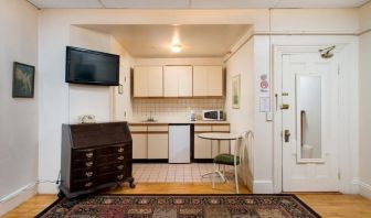 Day use room with TV and kitchenette at The Farrington Inn.