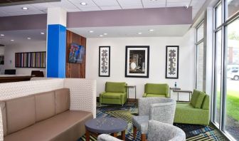 Lobby and coworking space at Holiday Inn Express & Suites Bensenville - O'Hare.