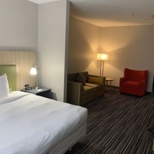 Spacious king room with private bathroom at Country Inn & Suites By Radisson, Chicago O'Hare South.