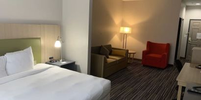 Spacious king room with private bathroom at Country Inn & Suites By Radisson, Chicago O'Hare South.