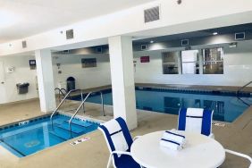 Indoor pool and hot tub at Country Inn & Suites By Radisson, Chicago O'Hare South.