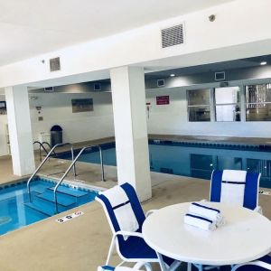 Indoor pool and hot tub at Country Inn & Suites By Radisson, Chicago O'Hare South.