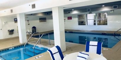 Indoor pool and hot tub at Country Inn & Suites By Radisson, Chicago O'Hare South.