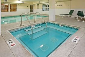 Relaxing indoor pool area at Country Inn & Suites By Radisson, Chicago O'Hare South.