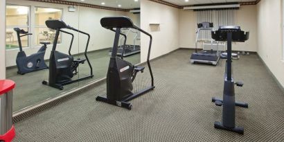 Fitness center available at Country Inn & Suites By Radisson, Chicago O'Hare South.