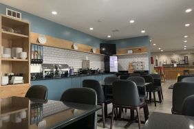 Dining and coworking space at Country Inn & Suites By Radisson, Chicago O'Hare South.