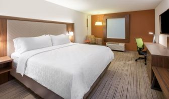 King bed with private bathroom at Holiday Inn Express & Suites Yorkville.