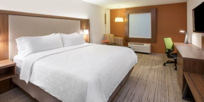 King bed with private bathroom at Holiday Inn Express & Suites Yorkville.