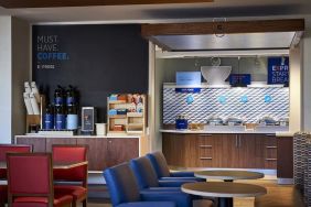 Dining and coworking space at Holiday Inn Express & Suites Yorkville.