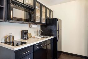 Kitchen available at Sonesta Simply Suites Detroit Warren.