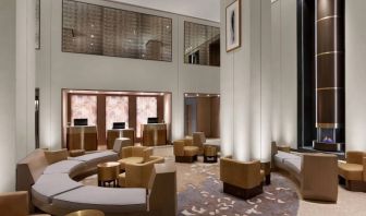 The hotel’s lobby lounge has extensive sofa and armchair seating, numerous coffee tables, and a fireplace.