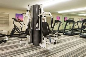 Sonesta Simply Suites Chicago Waukegan’s fitness center is equipped with free weights and various types of exercise machinery. 