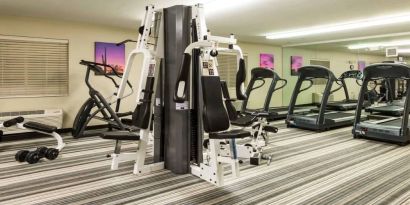 Sonesta Simply Suites Chicago Waukegan’s fitness center is equipped with free weights and various types of exercise machinery. 