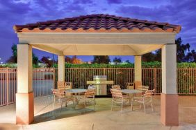 The gazebo at Sonesta Simply Suites Seattle Renton provides outdoors and under cover barbecue facilities, plus tables and chairs.