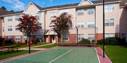 Sonesta ES Suites Birmingham Homewood’s outdoor sports court can be used for multiple activities, including tennis and basketball.