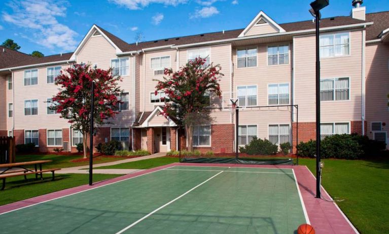 Sonesta ES Suites Birmingham Homewood’s outdoor sports court can be used for multiple activities, including tennis and basketball.