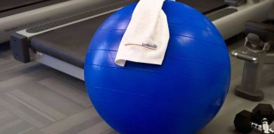 Sonesta ES Suites Atlanta - Perimeter Center North’s fitness center is equipped with gym balls, free weights, and exercise machines for guests to use.