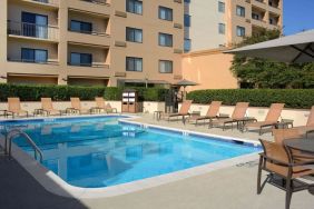 Relaxing outdoor pool at Sonesta Select Dallas Central Expressway.