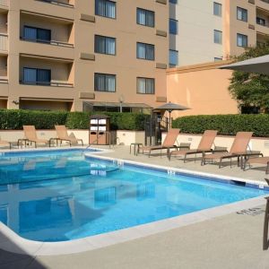 Relaxing outdoor pool at Sonesta Select Dallas Central Expressway.