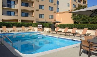 Relaxing outdoor pool at Sonesta Select Dallas Central Expressway.