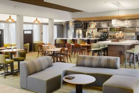 Lounge and coworking area at Sonesta Select Dallas Central Expressway.