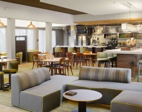 Lounge and coworking area at Sonesta Select Dallas Central Expressway.