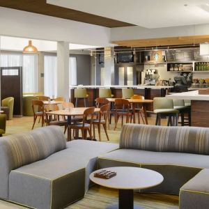 Lounge and coworking area at Sonesta Select Dallas Central Expressway.