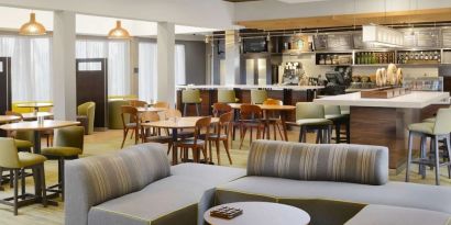 Lounge and coworking area at Sonesta Select Dallas Central Expressway.