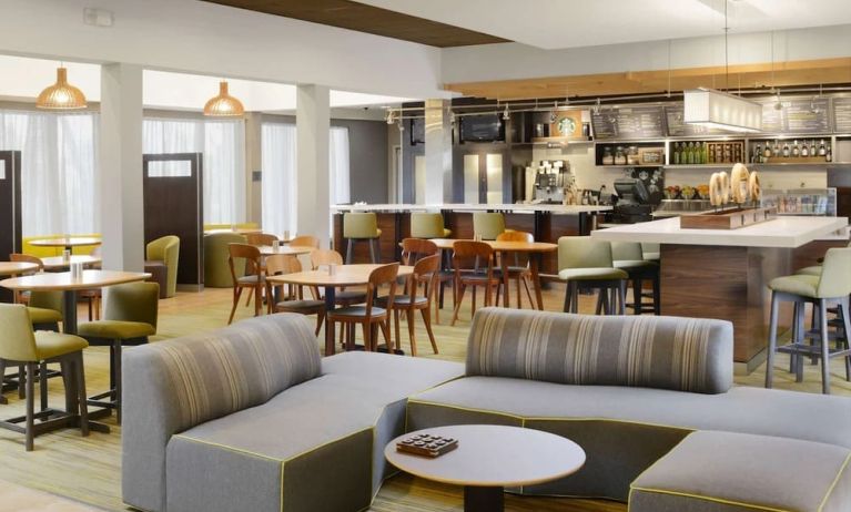 Lounge and coworking area at Sonesta Select Dallas Central Expressway.