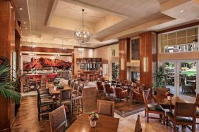 The hotel’s Heart Room Patio serves up breakfast in a setting of high ceilings and toasty fireplaces, with tables of varying sizes and numerous potted plants.