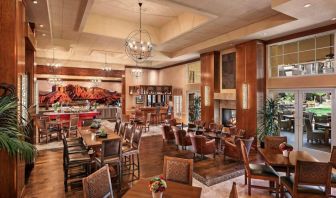 The hotel’s Heart Room Patio serves up breakfast in a setting of high ceilings and toasty fireplaces, with tables of varying sizes and numerous potted plants.