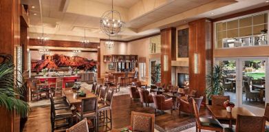 The hotel’s Heart Room Patio serves up breakfast in a setting of high ceilings and toasty fireplaces, with tables of varying sizes and numerous potted plants.