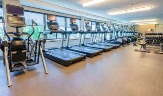 The fitness center in Sonesta San Jose is fully equipped with racks of free weights, benches, and assorted exercise machines including treadmills and ellipticals.