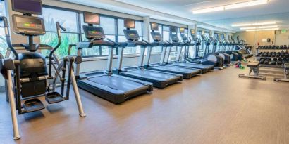 The fitness center in Sonesta San Jose is fully equipped with racks of free weights, benches, and assorted exercise machines including treadmills and ellipticals.