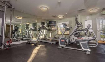 Sonesta ES Suites Anaheim Resort Area’s fitness center is equipped with a wide range of different exercise machines, and has a wall-mounted television.