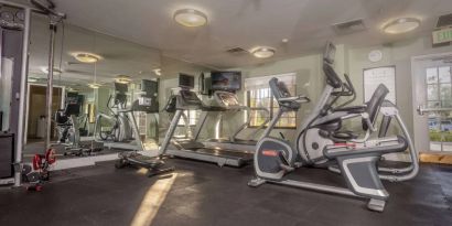 Sonesta ES Suites Anaheim Resort Area’s fitness center is equipped with a wide range of different exercise machines, and has a wall-mounted television.