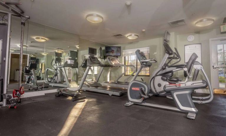 Sonesta ES Suites Anaheim Resort Area’s fitness center is equipped with a wide range of different exercise machines, and has a wall-mounted television.