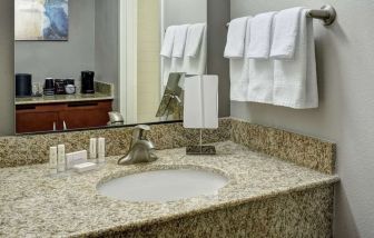 Guest bathroom at Sonesta Select Milwaukee Brookfield.