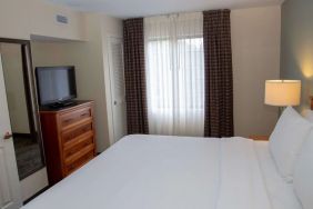 Sonesta ES Suites San Antonio Northwest - Medical Center guest room, furnished with double bed and widescreen television.