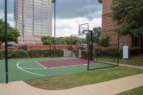 The hotel’s basketball court provides the chance to stay fit in the fresh air and is separated from the car park with fencing.